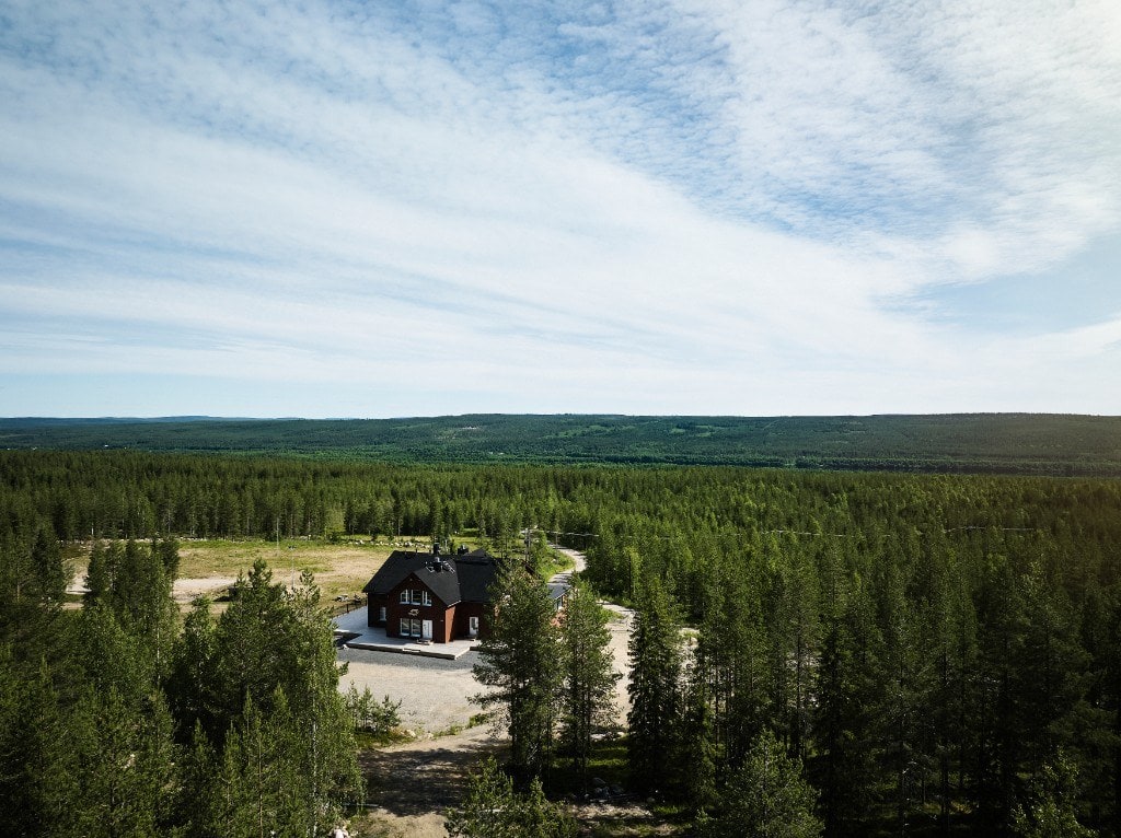 A private lodge amid the green summer forests of Lapland